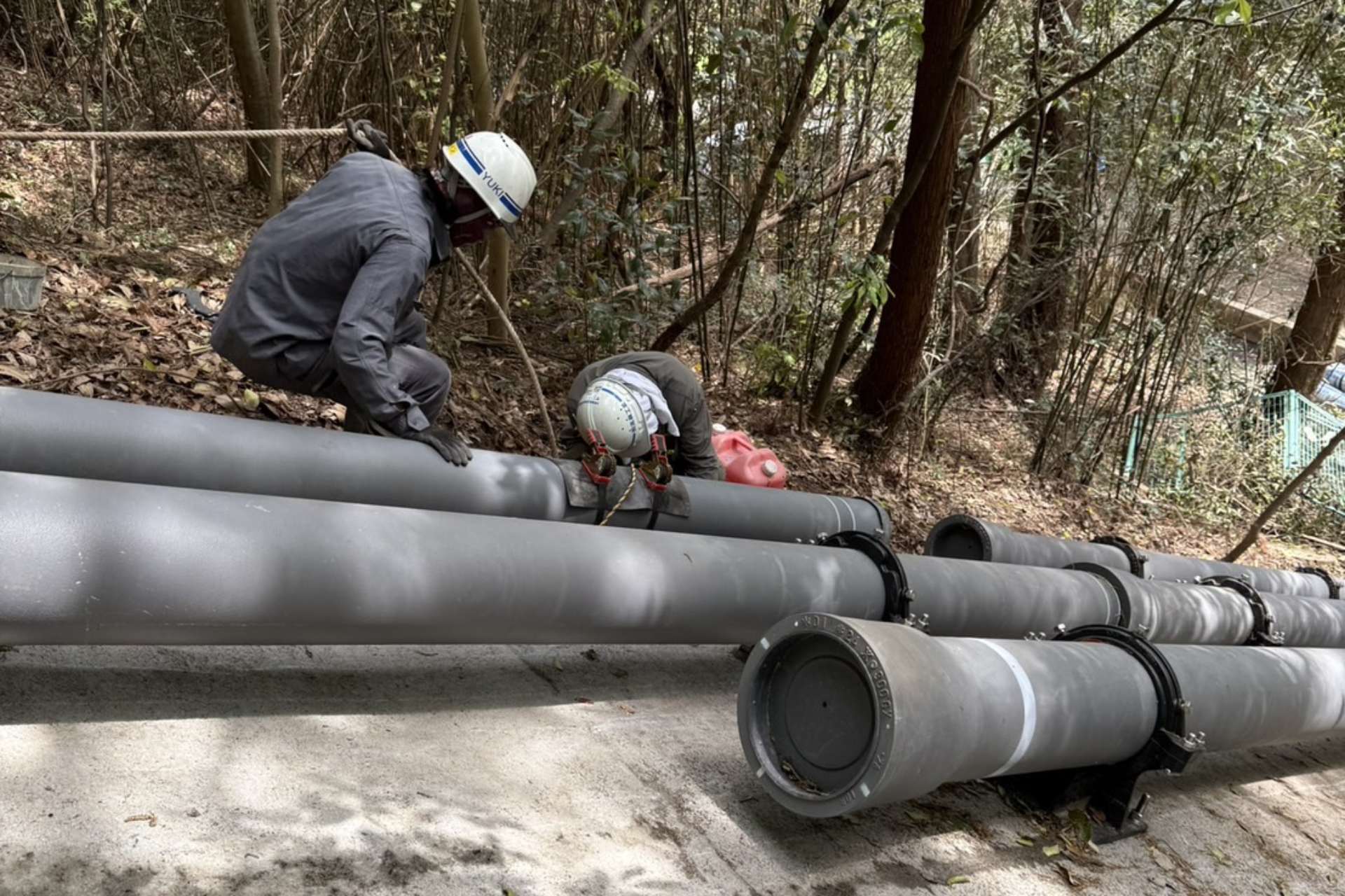 水道施設作業風景の背景画像